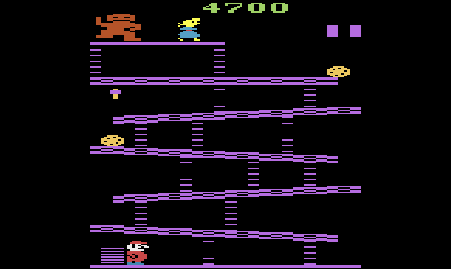 The barrel screen in play: barrels rolling down the sloped girders while the bonus counts down at the top.